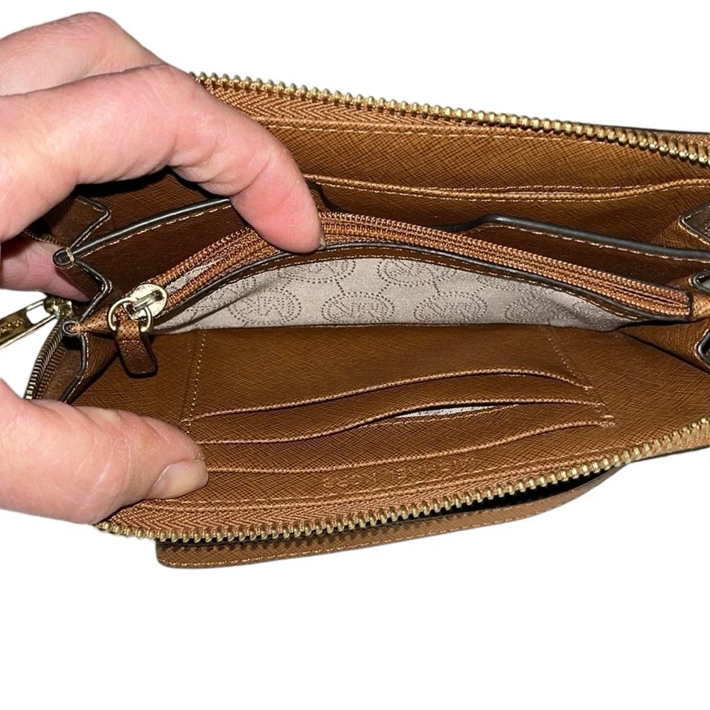 Micheal Kors brown saffiano leather wristlet phone wallet , card case